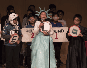 Elementary students put on plays to demonstrate the points in their essays.