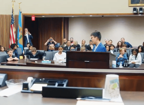 Mock Trial 3 Student at podium arguing a case in a mock trial.